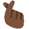 Hand with Index Finger and Thumb Crossed- Dark Skin Tone emoji on Twitter